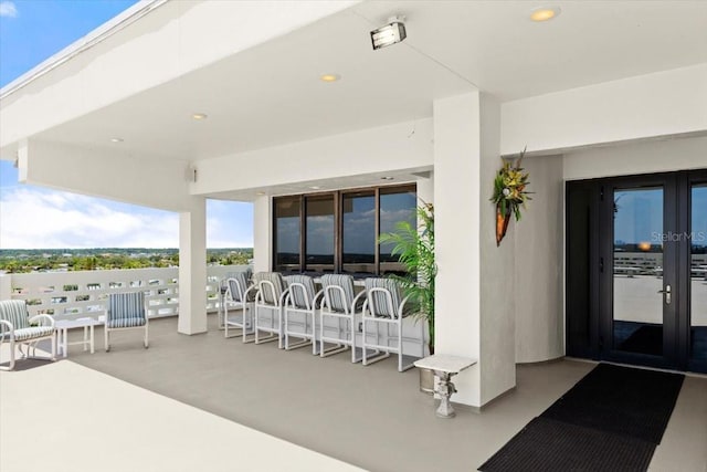 915 Ocean Shore Blvd Unit 8010, Ormond Beach, FL 32176 - view of patio with french doors