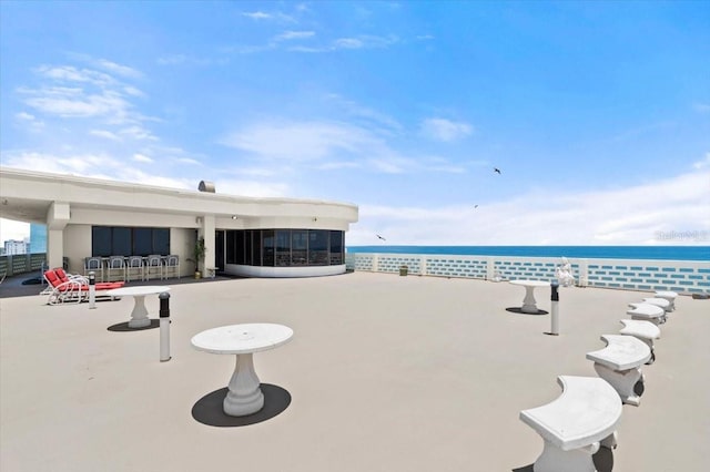 915 Ocean Shore Blvd Unit 8010, Ormond Beach, FL 32176 - view of patio featuring a water view