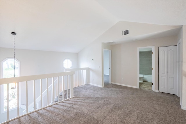 15 Misners Trl, Ormond Beach, FL 32174 - empty room with lofted ceiling and carpet flooring
