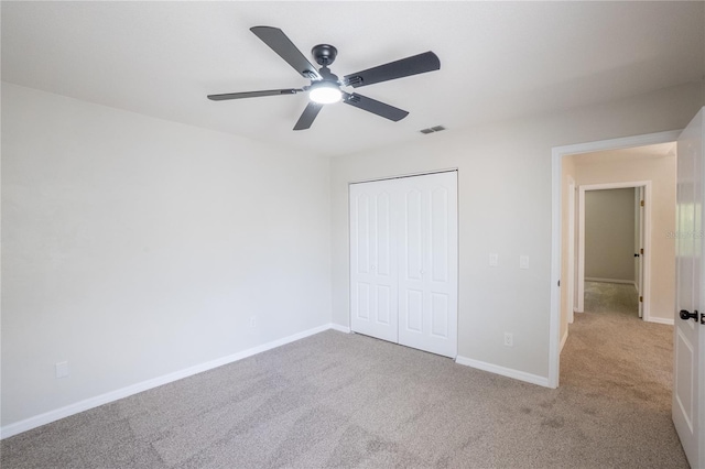 15 Misners Trl, Ormond Beach, FL 32174 - unfurnished bedroom featuring carpet, a closet, and ceiling fan