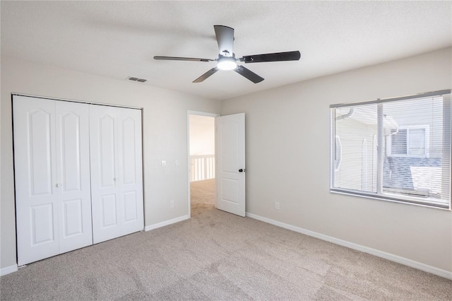 15 Misners Trl, Ormond Beach, FL 32174 - unfurnished bedroom featuring carpet floors, a closet, and ceiling fan