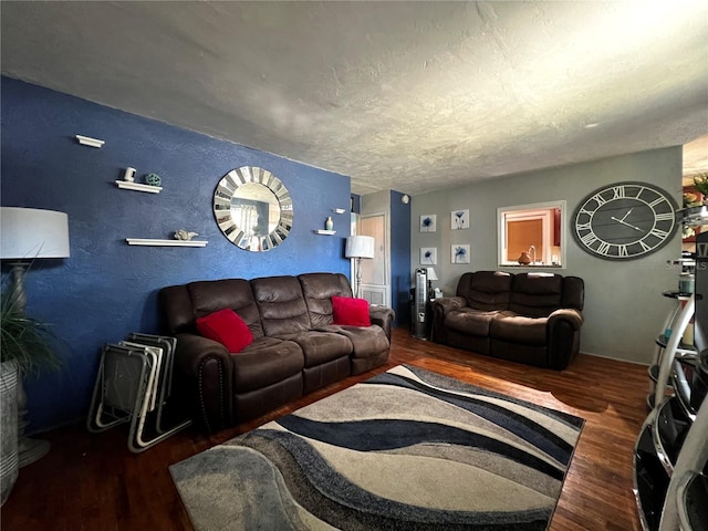 601 Berkshire Rd, Daytona Beach, FL 32114 - living room featuring wood finished floors, a textured wall, and a textured ceiling