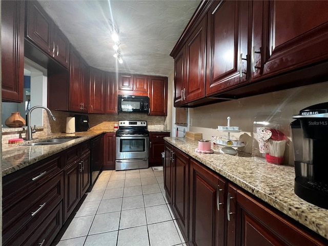 601 Berkshire Rd, Daytona Beach, FL 32114 - kitchen with black appliances, a sink, tasteful backsplash, light tile patterned flooring, and reddish brown cabinets