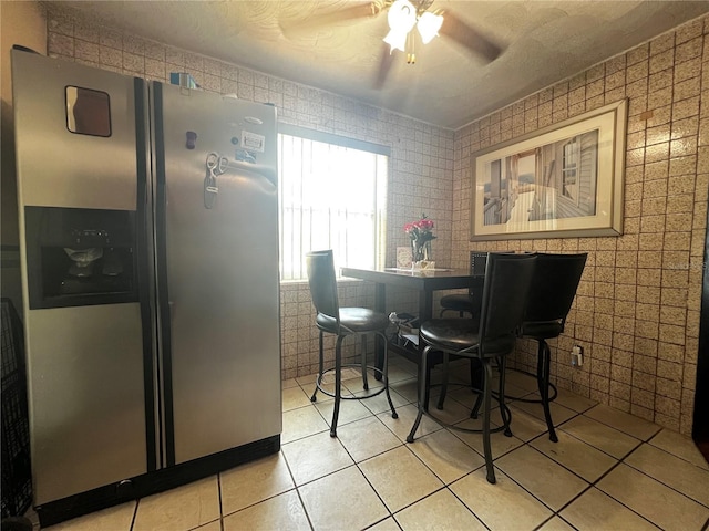 601 Berkshire Rd, Daytona Beach, FL 32114 - dining area featuring a ceiling fan and light tile patterned flooring