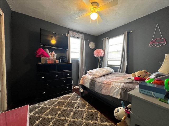 601 Berkshire Rd, Daytona Beach, FL 32114 - bedroom with multiple windows and ceiling fan
