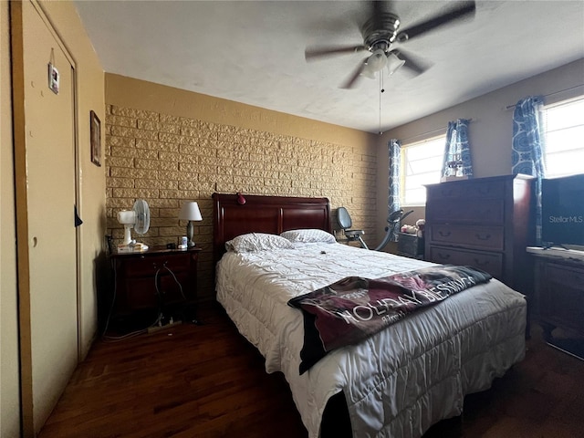 601 Berkshire Rd, Daytona Beach, FL 32114 - bedroom featuring wood finished floors, multiple windows, and a ceiling fan