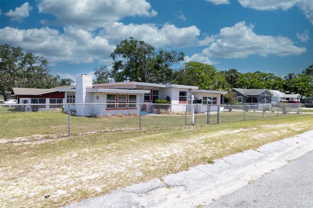 601 Berkshire Rd, Daytona Beach, FL 32114 - view of front of property featuring a chimney