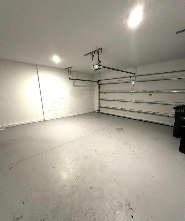 112 Lost Ball Dr, Daytona Beach, FL 32124 - garage featuring a garage door opener