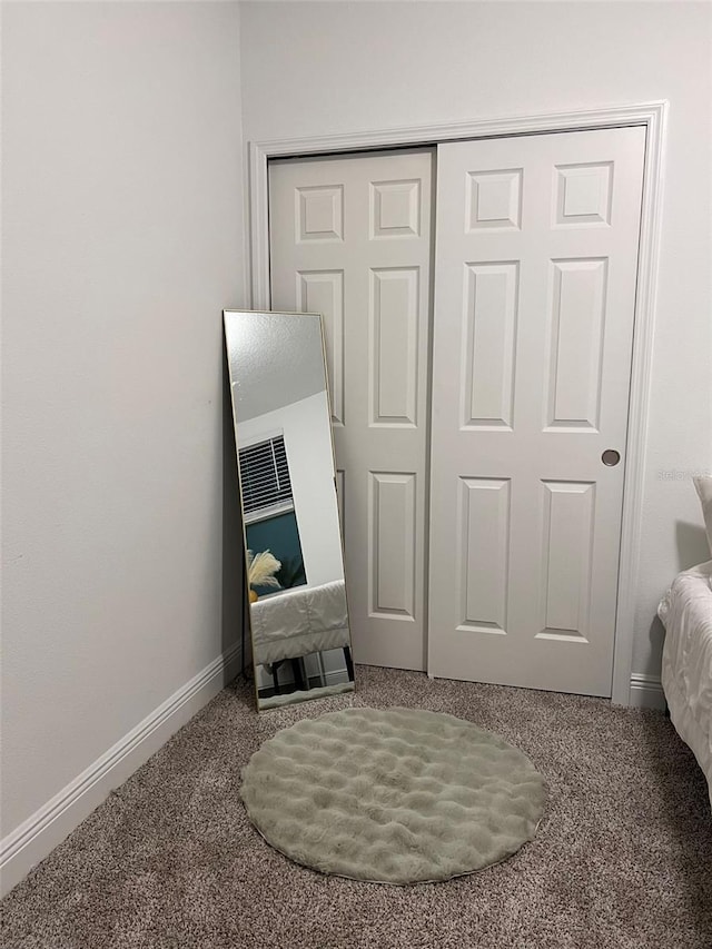 112 Lost Ball Dr, Daytona Beach, FL 32124 - carpeted bedroom featuring a closet and baseboards