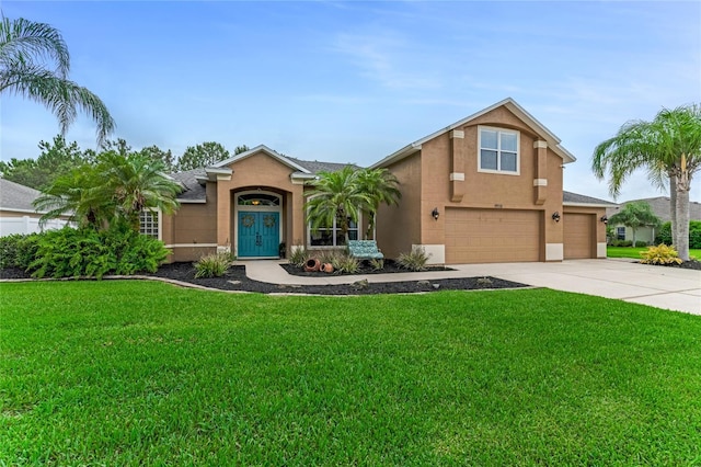 1910 Creekwater Blvd, Port Orange, FL 32128 - view of front facade featuring stucco siding, an attached garage, a front yard, and driveway