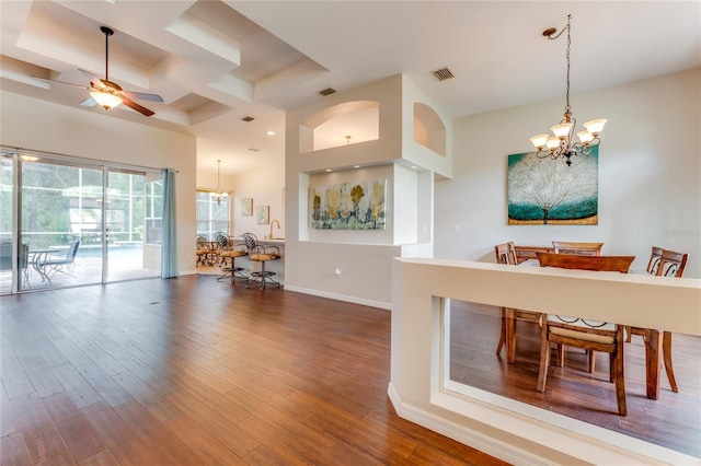1910 Creekwater Blvd, Port Orange, FL 32128 - living area featuring a chandelier, a ceiling fan, wood finished floors, and coffered ceiling