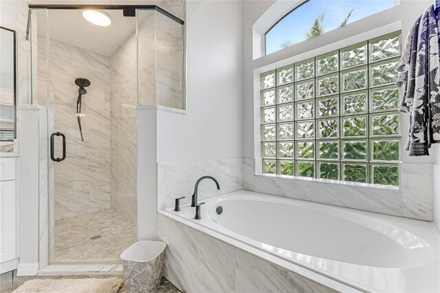 1910 Creekwater Blvd, Port Orange, FL 32128 - bathroom featuring a stall shower and a garden tub
