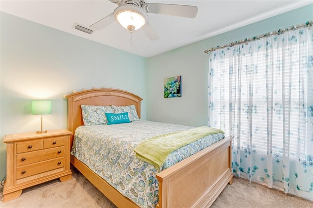 1910 Creekwater Blvd, Port Orange, FL 32128 - bedroom featuring light carpet and ceiling fan
