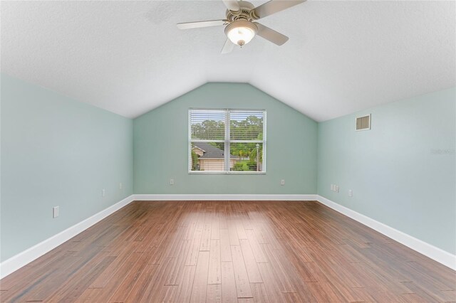 1910 Creekwater Blvd, Port Orange, FL 32128 - bonus room with wood finished floors, lofted ceiling, a ceiling fan, and baseboards