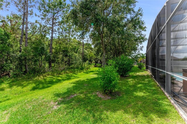 1910 Creekwater Blvd, Port Orange, FL 32128 - view of green lawn with a lanai