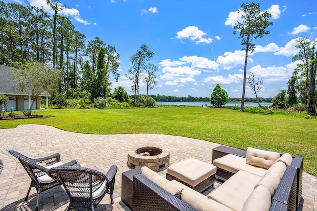 5366 N Lake Farms Rd, De Leon Springs, FL 32130 - view of patio / terrace with a water view and an outdoor living space with a fire pit