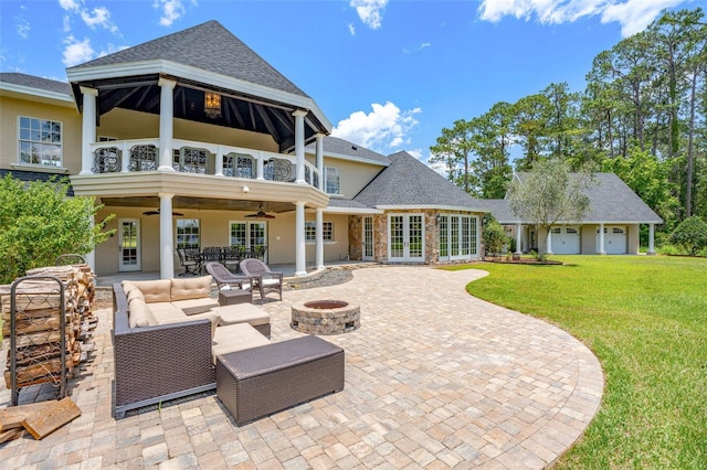 5366 N Lake Farms Rd, De Leon Springs, FL 32130 - rear view of property with french doors, a lawn, a ceiling fan, a patio area, and roof with shingles