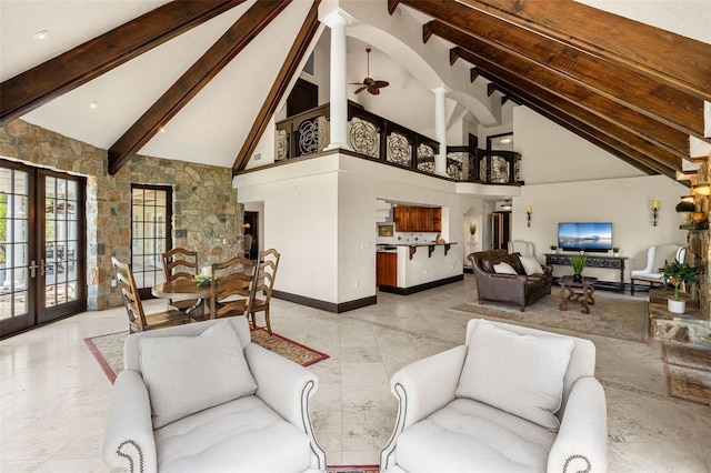 5366 N Lake Farms Rd, De Leon Springs, FL 32130 - living room featuring beam ceiling, french doors, high vaulted ceiling, ceiling fan, and light tile patterned floors