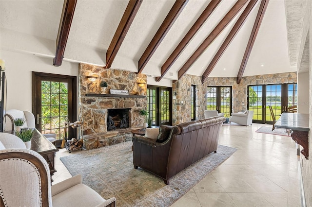 5366 N Lake Farms Rd, De Leon Springs, FL 32130 - living room with beam ceiling, a stone fireplace, plenty of natural light, high vaulted ceiling, and light tile patterned floors