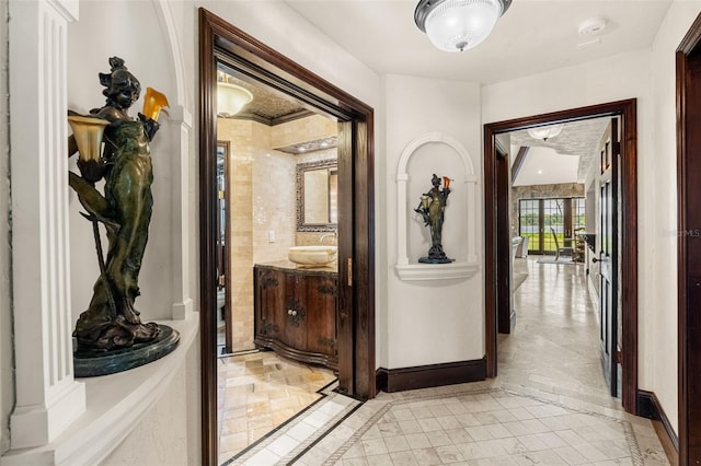 5366 N Lake Farms Rd, De Leon Springs, FL 32130 - hallway with inlaid floor details and baseboards