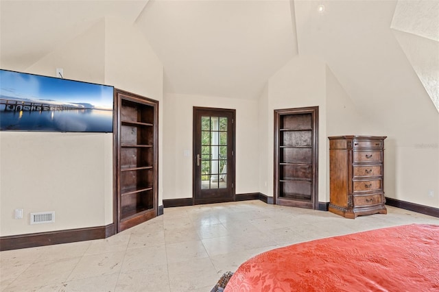 5366 N Lake Farms Rd, De Leon Springs, FL 32130 - bedroom with vaulted ceiling, tile patterned floors, and access to outside