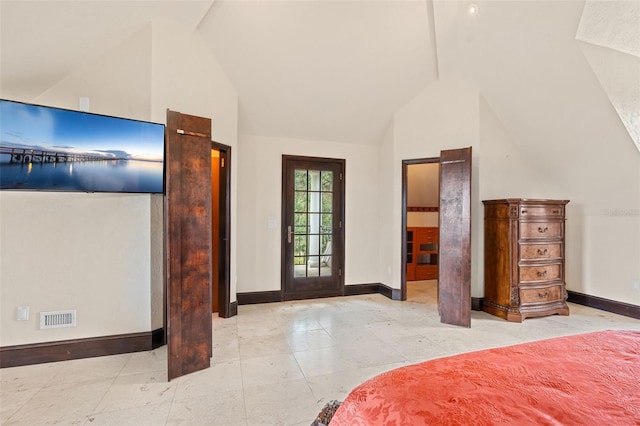5366 N Lake Farms Rd, De Leon Springs, FL 32130 - tiled bedroom featuring lofted ceiling