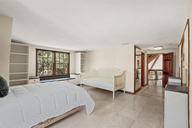 5366 N Lake Farms Rd, De Leon Springs, FL 32130 - bedroom with baseboards