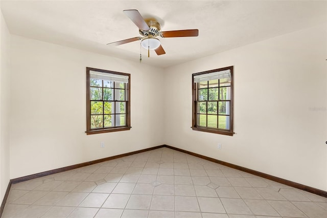 5366 N Lake Farms Rd, De Leon Springs, FL 32130 - unfurnished room with baseboards and a ceiling fan