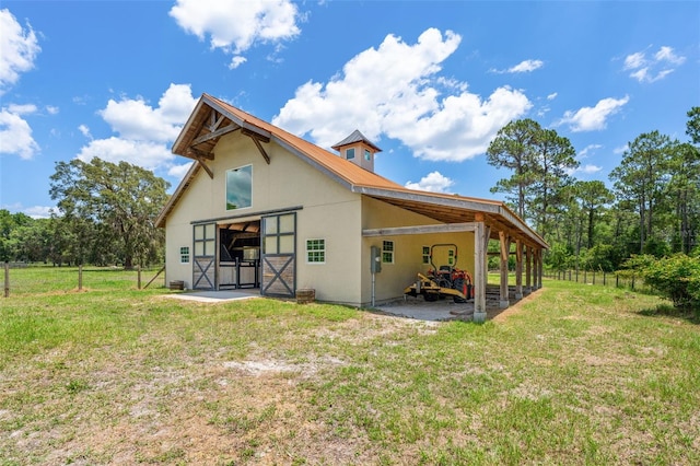 5366 N Lake Farms Rd, De Leon Springs, FL 32130 - back of house with a carport