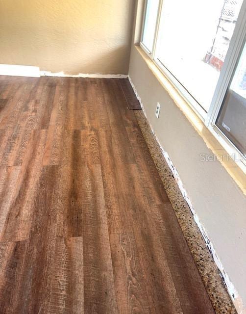 3 Cassia Ln, Debary, FL 32713 - detailed view of wood finished floors and baseboards
