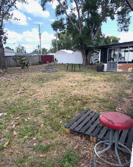 3 Cassia Ln, Debary, FL 32713 - view of yard featuring a sunroom