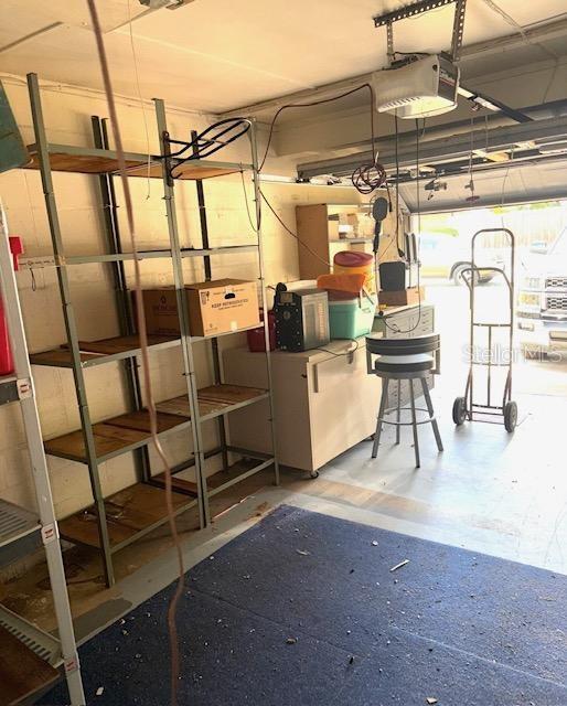 3 Cassia Ln, Debary, FL 32713 - garage featuring a garage door opener