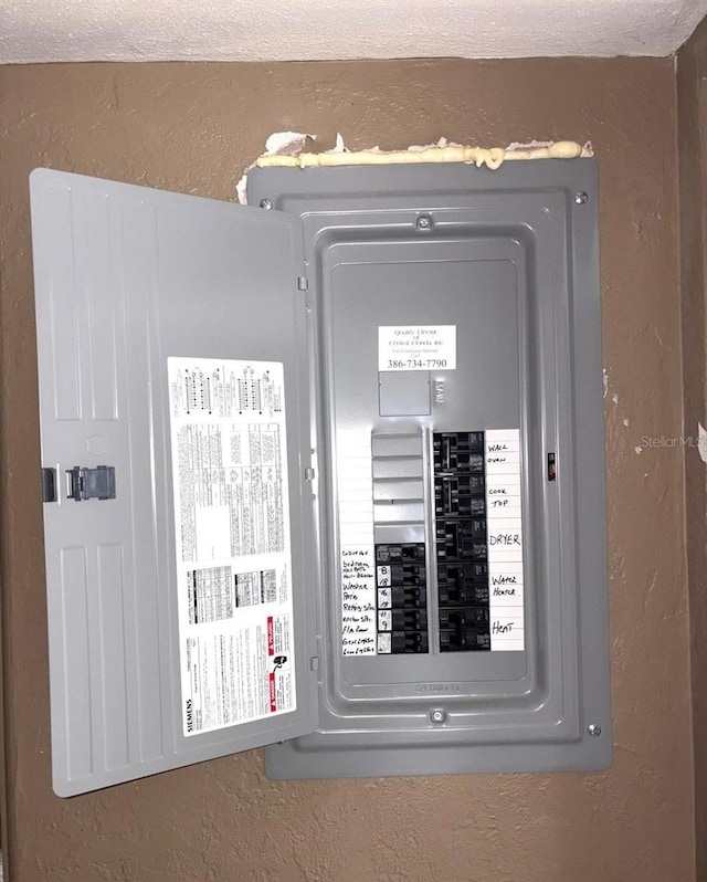 3 Cassia Ln, Debary, FL 32713 - utility room featuring electric panel