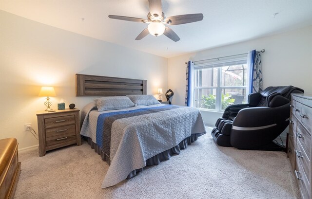 1671 Pecorino Ct, Titusville, FL 32780 - bedroom with light carpet, ceiling fan, and baseboards