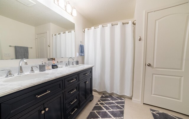 1671 Pecorino Ct, Titusville, FL 32780 - full bathroom with double vanity, tile patterned floors, and a shower with shower curtain