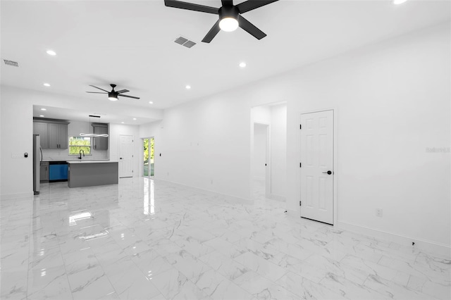 1163 W Hancock Dr, Deltona, FL 32725 - unfurnished living room featuring ceiling fan and recessed lighting