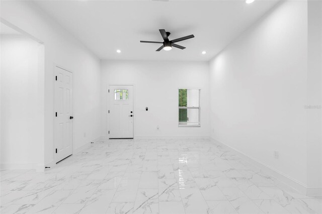 1163 W Hancock Dr, Deltona, FL 32725 - empty room with recessed lighting, a ceiling fan, and light marble finish floors
