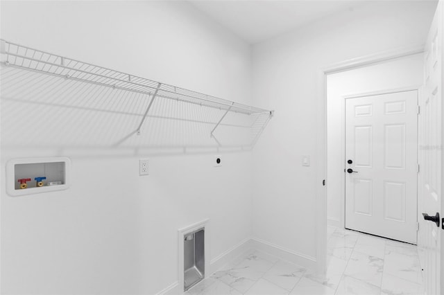 1163 W Hancock Dr, Deltona, FL 32725 - washroom with hookup for a washing machine, hookup for an electric dryer, and light marble finish flooring