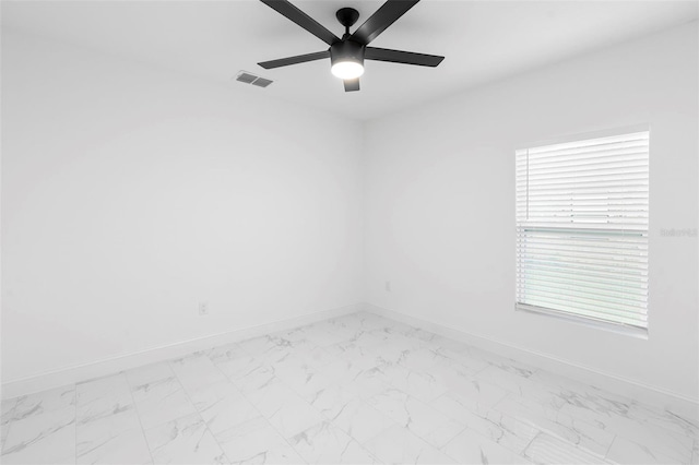 1163 W Hancock Dr, Deltona, FL 32725 - spare room featuring ceiling fan and light marble finish flooring