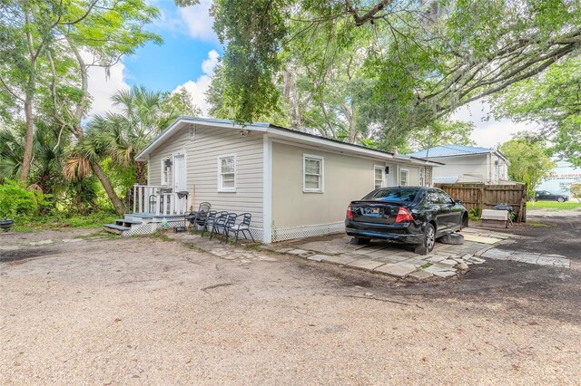 449 3rd St, Daytona Beach, FL 32117 - view of front of home with a deck