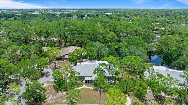 aerial overview of property's location featuring a forest
