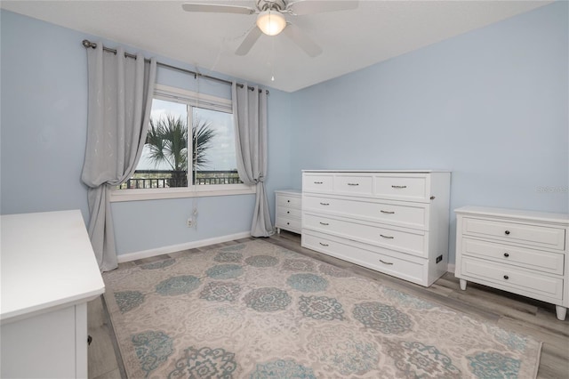 2222 Ocean Shore Blvd Unit 304B, Ormond Beach, FL 32176 - bedroom featuring wood finished floors and a ceiling fan