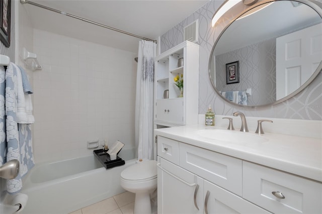 2222 Ocean Shore Blvd Unit 304B, Ormond Beach, FL 32176 - full bathroom featuring vanity, tile patterned floors, and shower / bath combo with shower curtain