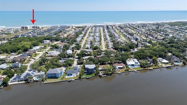 2222 Ocean Shore Blvd Unit 304B, Ormond Beach, FL 32176 - aerial view of property and surrounding area featuring a large body of water and nearby suburban area