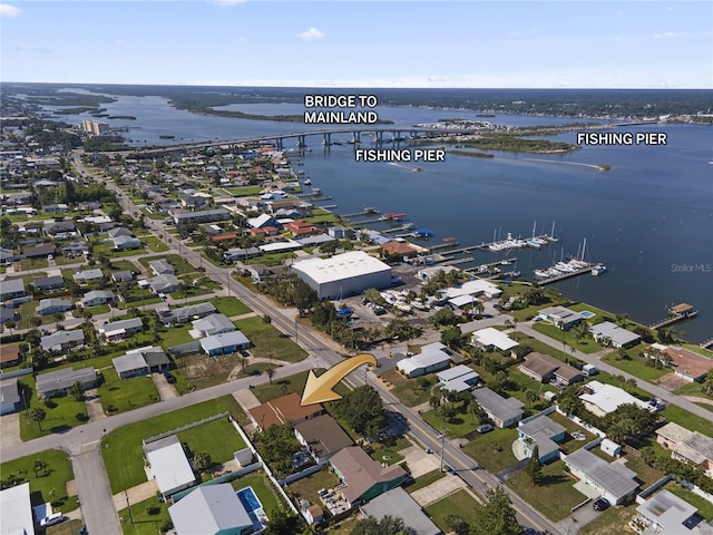 3267 S Peninsula Dr, Daytona Beach, FL 32118 - aerial view of property and surrounding area with a notable bridge and a nearby body of water