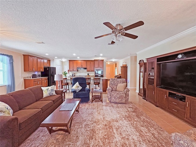 110 No Name Key Dr, Deland, FL 32720 - living area featuring ceiling fan, ornamental molding, light tile patterned flooring, a textured ceiling, and recessed lighting