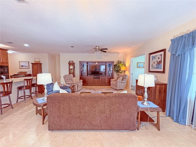 110 No Name Key Dr, Deland, FL 32720 - living area featuring a textured ceiling, a ceiling fan, light tile patterned flooring, and recessed lighting