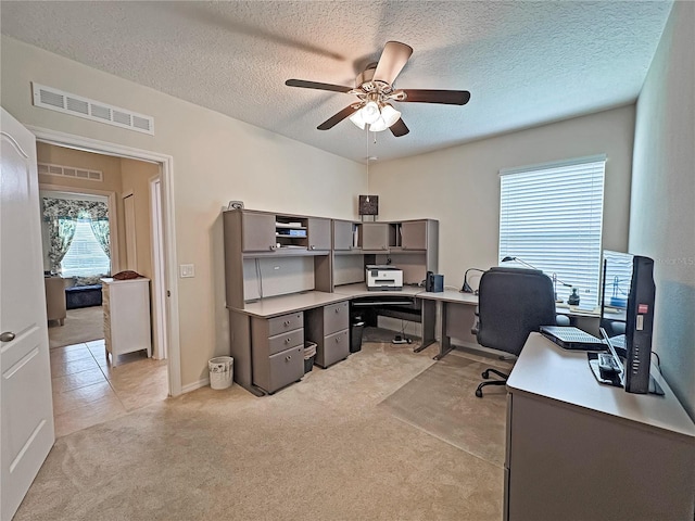 110 No Name Key Dr, Deland, FL 32720 - office area featuring light colored carpet, ceiling fan, a textured ceiling, and baseboards