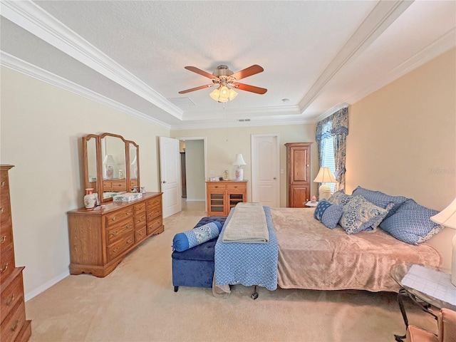 110 No Name Key Dr, Deland, FL 32720 - bedroom with a tray ceiling, ornamental molding, light carpet, a ceiling fan, and baseboards