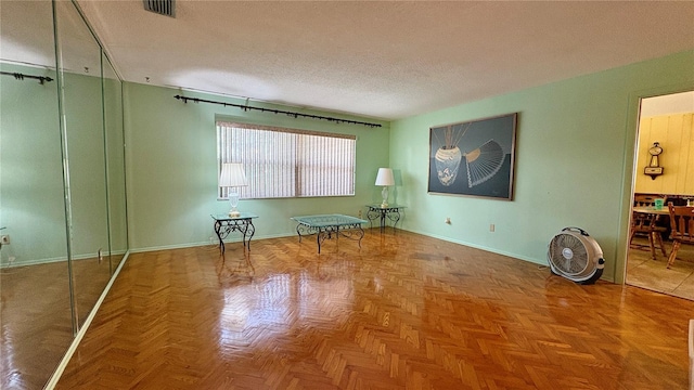 1301 Killian St, Daytona Beach, FL 32114 - unfurnished room featuring a textured ceiling and baseboards